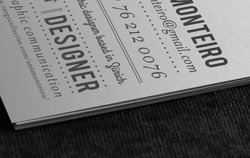 Card close-up: the script line “a graphic designer based in Zürich”, “Designer” in bold between dotted rules, and “graphic communication” in typewriter type